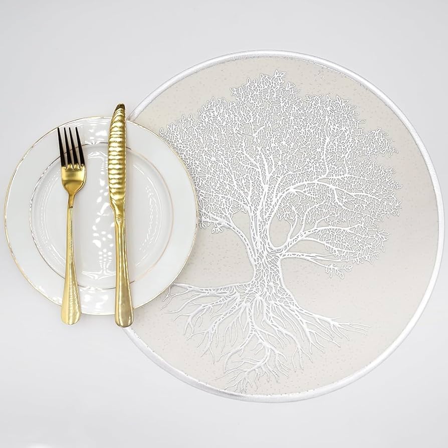 "Set of modern, minimalist dining mats in neutral tones on a dining table, complementing the tableware and offering a clean, organized look."