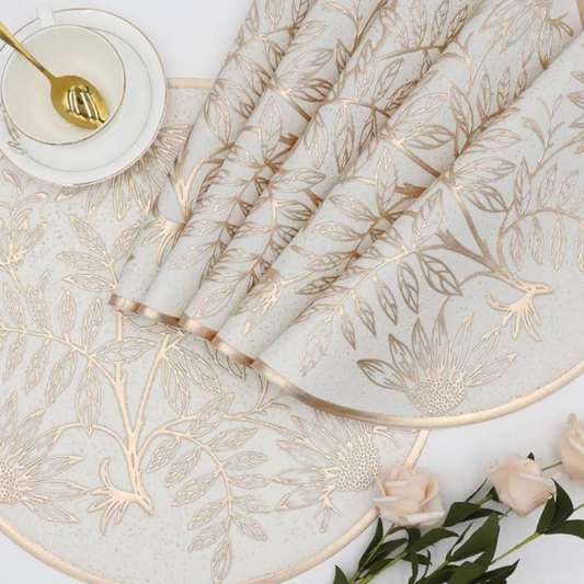 "Close-up of a neatly arranged dining table with decorative placemats in soft fabric, adding a touch of style and protection to the surface."