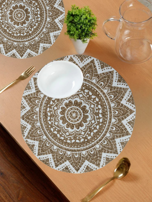 placemat with intricate brown and white mandala design