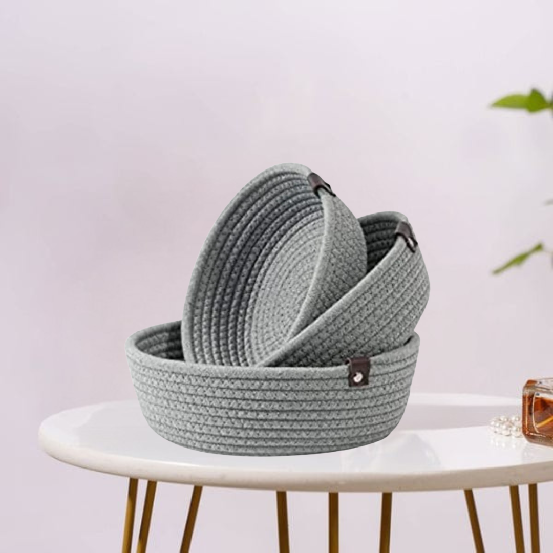 Neutral-toned rope basket made from 100% cotton for versatile storage.
