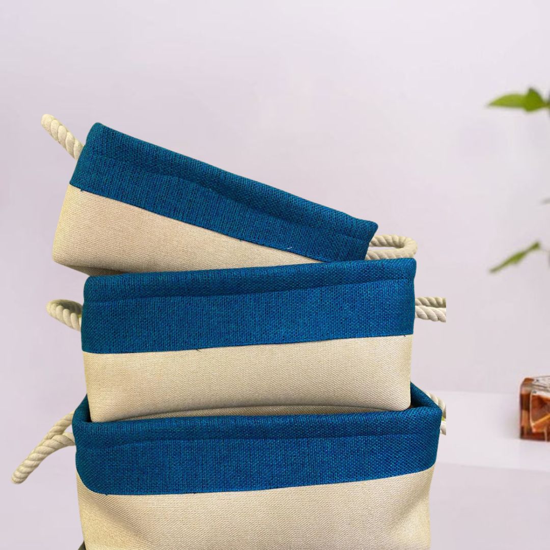 Open-top jute basket with braided handle and honeycomb pattern sides.