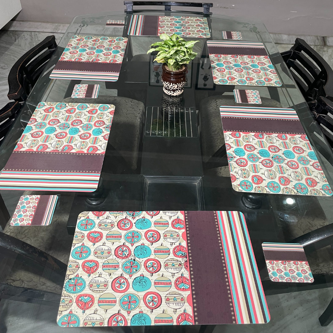 doodle printed design in purple color dining mats set of 6 with tea coasters placed on glass dining table