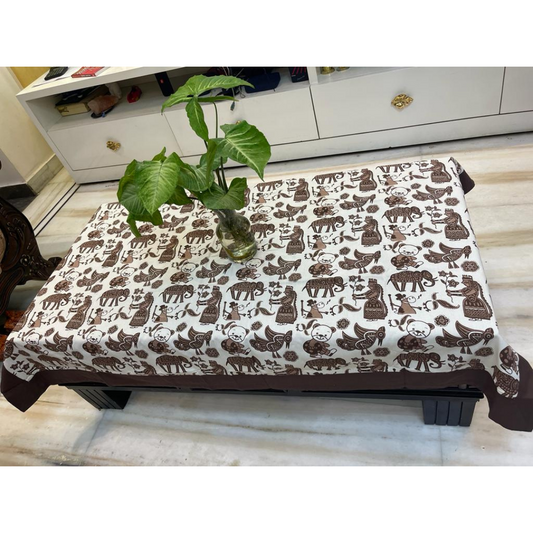 Loomsmith-floral-printed-cotton-fabric-table-cover-with-coffee-border-with-elephant-print-plant-placed-on-the-table