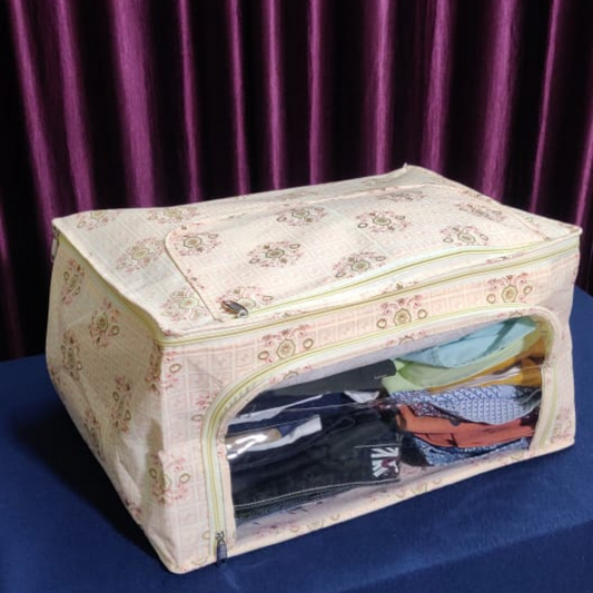 loomsmith-transparent-designer-heavy-quality-saree-cover-printed-bag-to-keep-clothes-organized-and-clean-bag-placed-on-table-in-front-of-purple-curtain