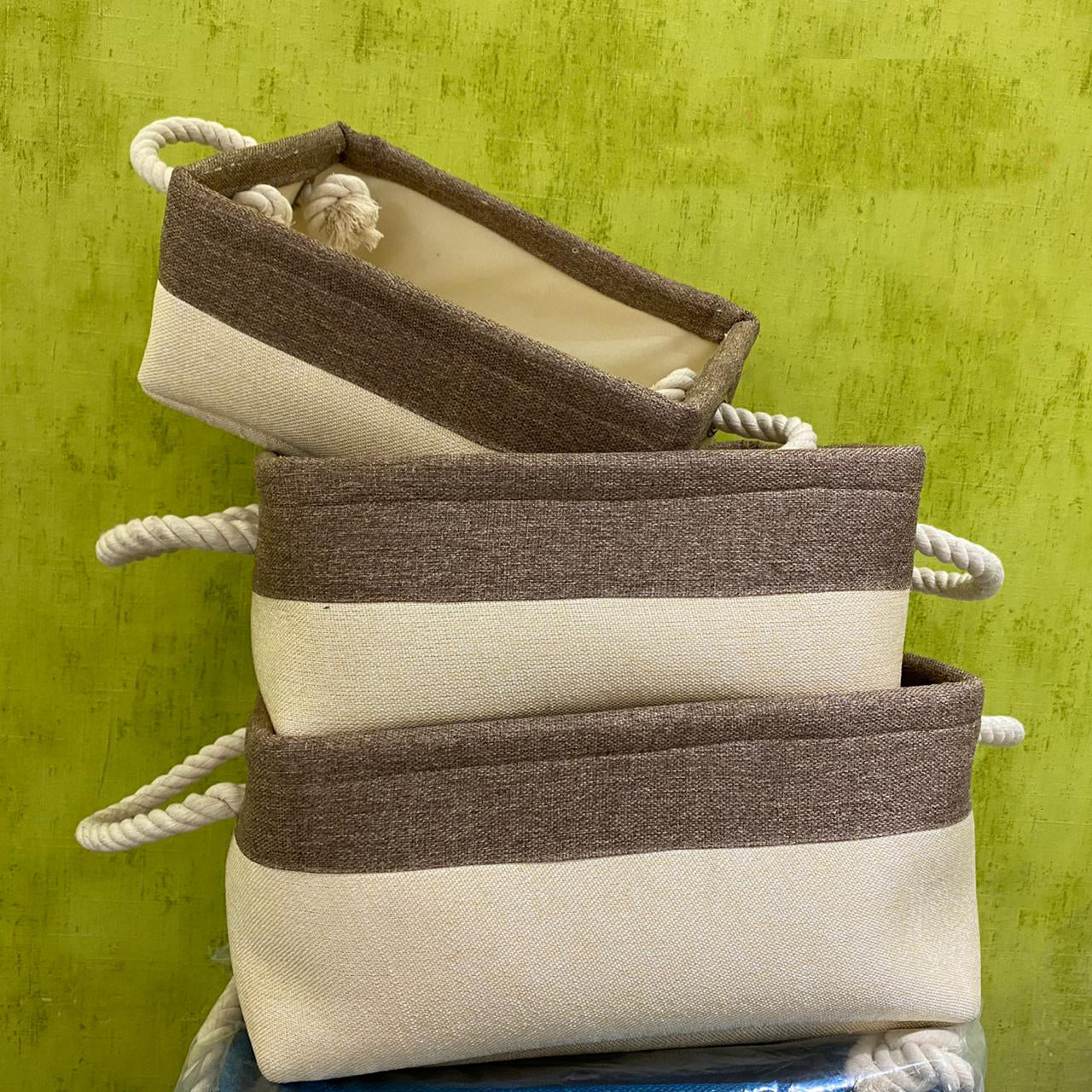 beige-color-three-jute-storage-basket-with-drawstring-handle-in-brown-sizes-rope-handle-to-store-purpose