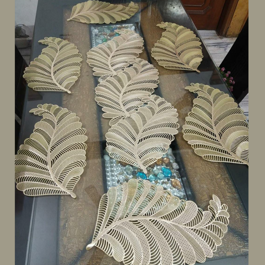 loomsmith-combo-of-table-runner-for-six-seater-dining-table-leaves-shaped-of-golden-color-placed-on-marble-dining-table-