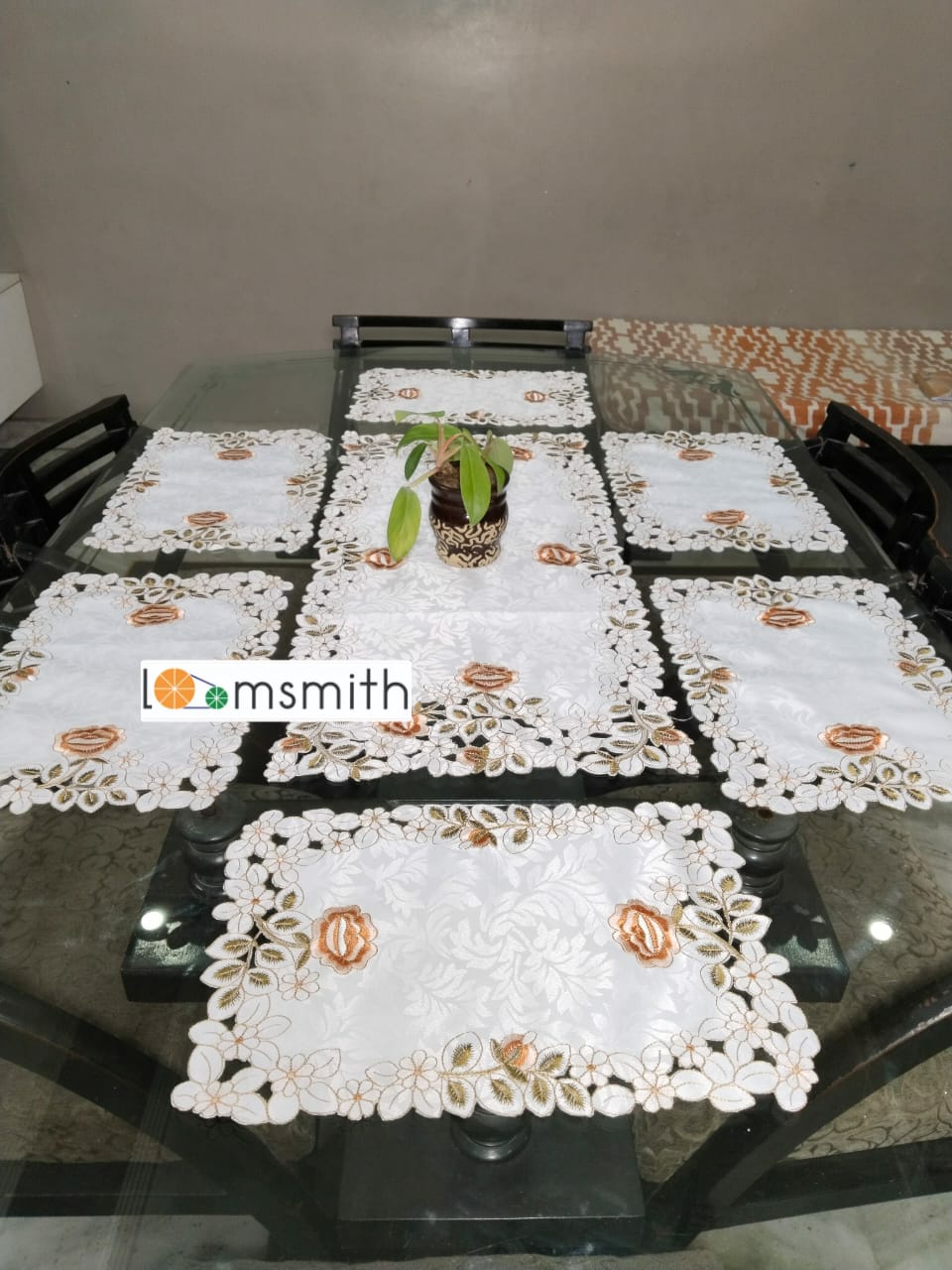 "Modern table runner and mats on a dining table, showcasing a sleek design to complement any home decor."