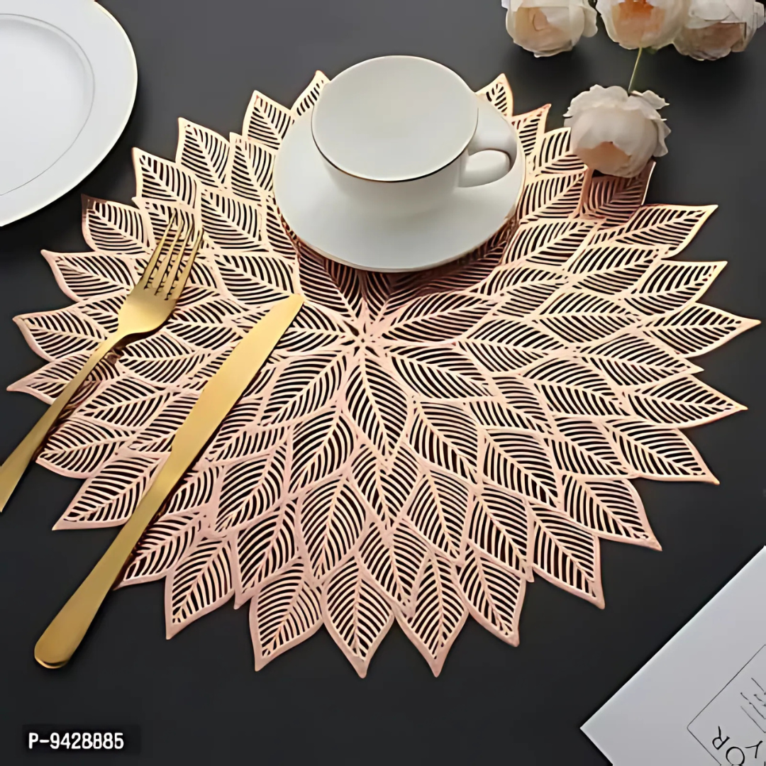 "Elegant Plastic table mats with intricate patterns, adding a touch of sophistication and protection to your dining table."



