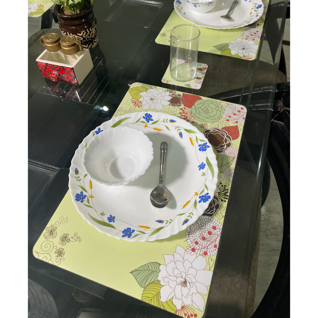 floral printed design in green color dining mats set of 6 with tea coasters placed on glass dining table  zoom view