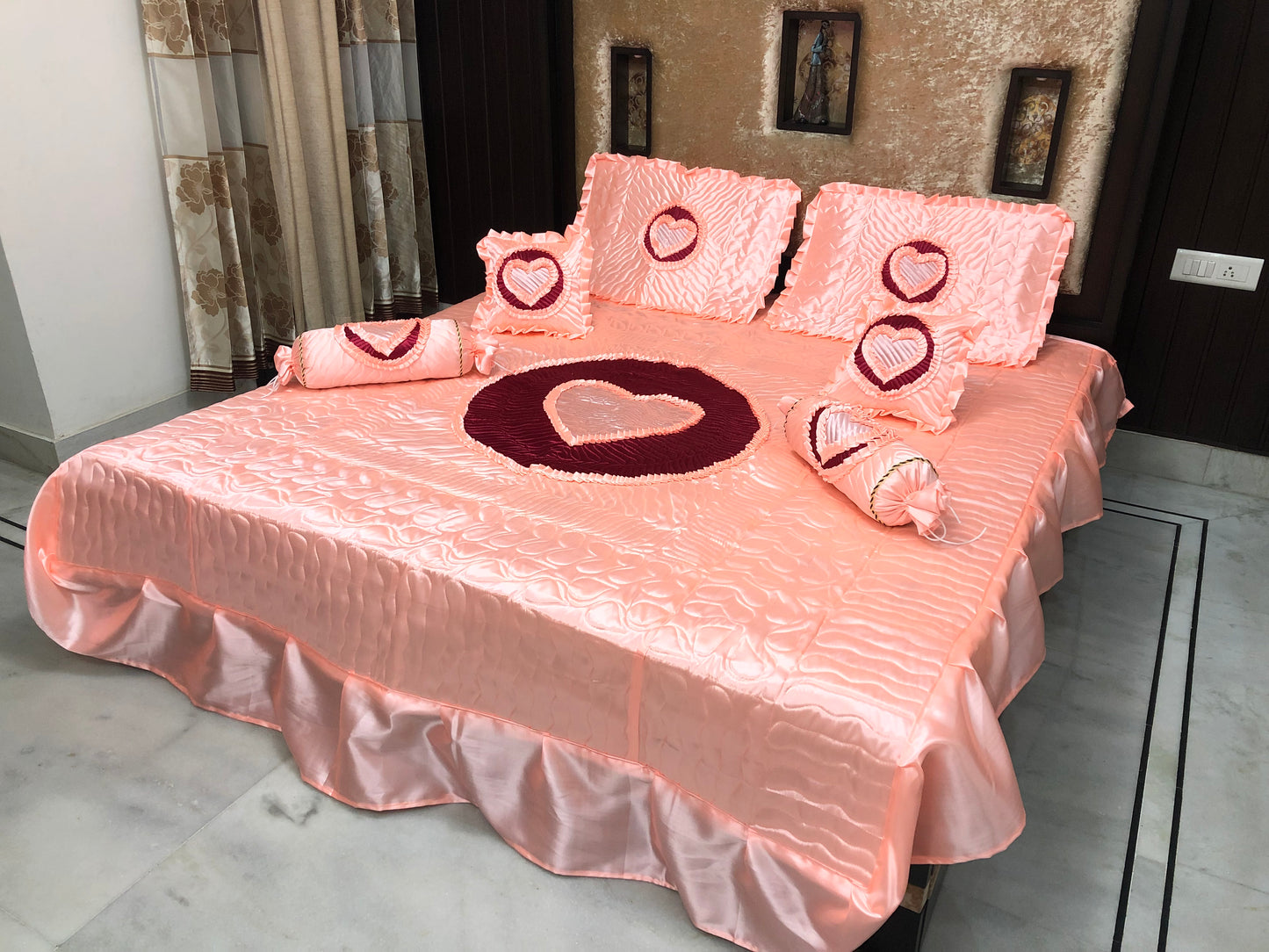 loomsmith-satin-bedsheet-set-of-7-in-peach-color-two-filled-cushions-two-filled-bolsters-King-Size-set-two-pillow-covers