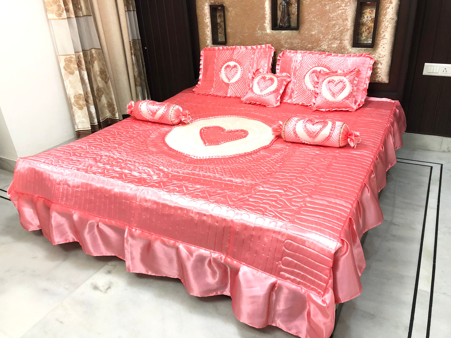 loomsmith-satin-bedsheet-set-of-7-heart-design-in-carrot-color-two-filled-cushions-two-filled-bolsters-King-Size-set-two-pillow-covers