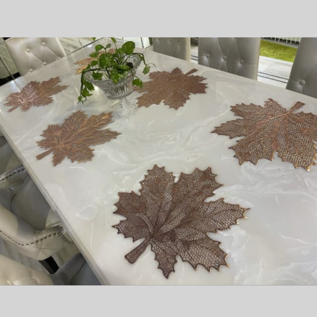 autumn leaf laser cut metallic placemat set of 6 copper color placed on white dining table