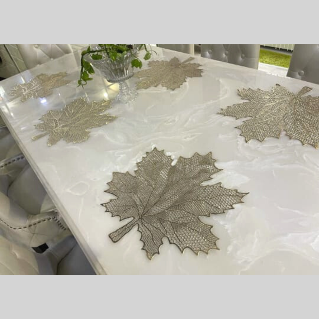 autumn leaf laser cut metallic placemat set of 6 gold color placed on white dining table