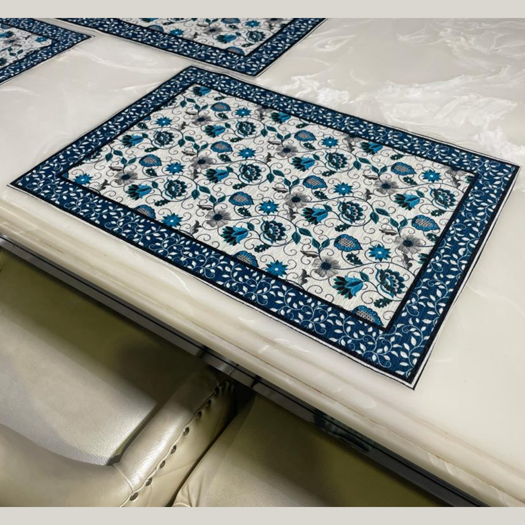 floral printed table placemat of velvet fabric heavy borders designed with floral print blue color placemat zoom placed on white marble 6 seater dining table