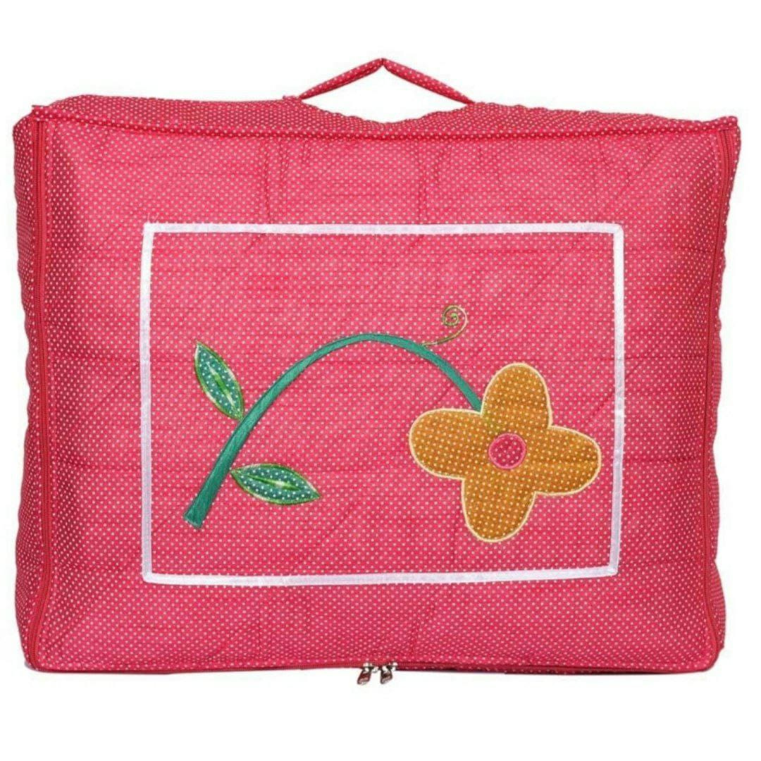 saree cover bag in cotton fabric front side designed with a flower and polka dots with strong handle in pink color with zip closure