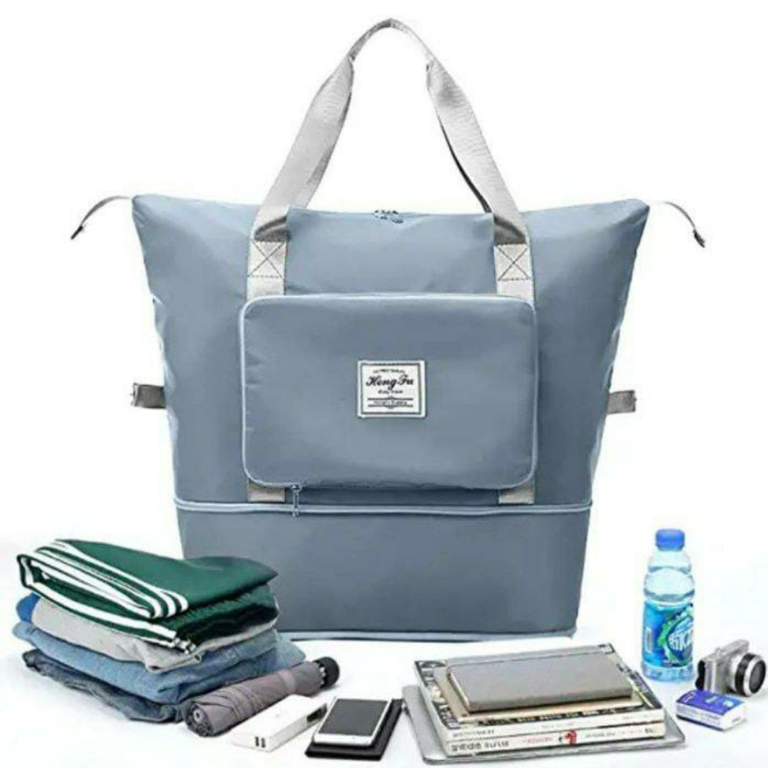 Blue foldable expandable carry bag with strong handles with large capacity storage