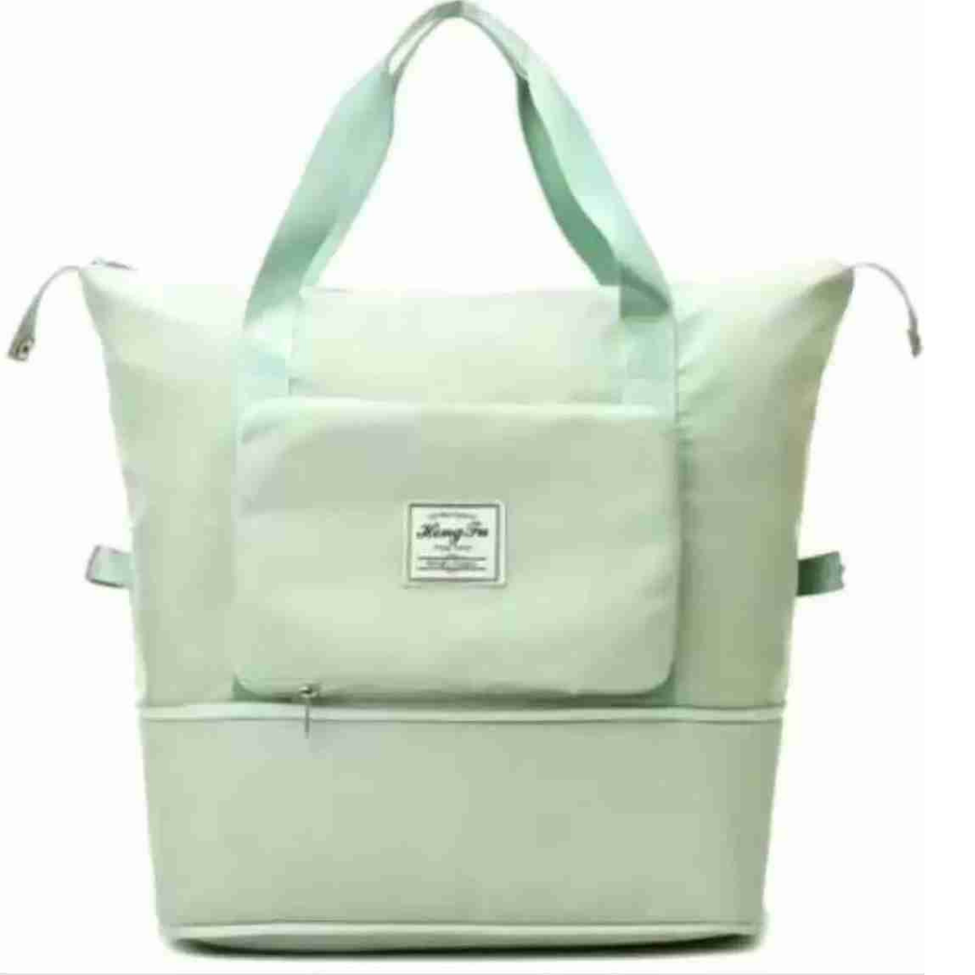 Green foldable expandable carry bag with strong handles with large capacity storage