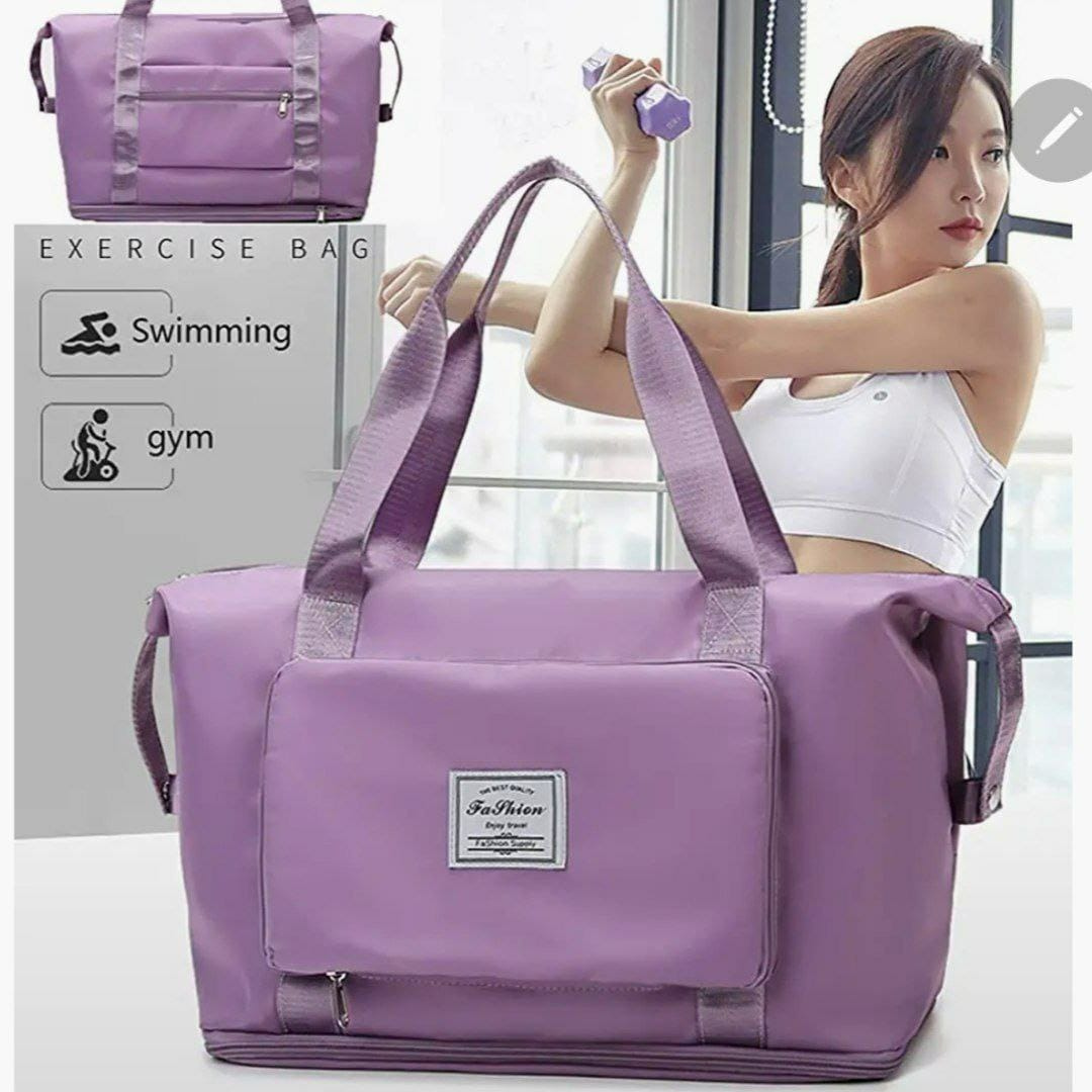Purple foldable expandable carry bag with strong handles with large capacity storage
