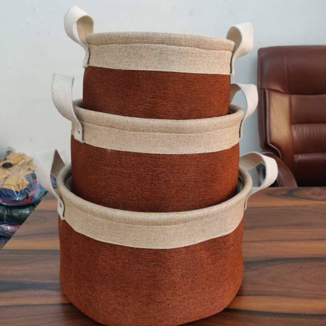 loomsmith-round-jute-storage-basket-in-brown-beige-color-set-of-three-in-different-sizes-placed-on-table-storage-use