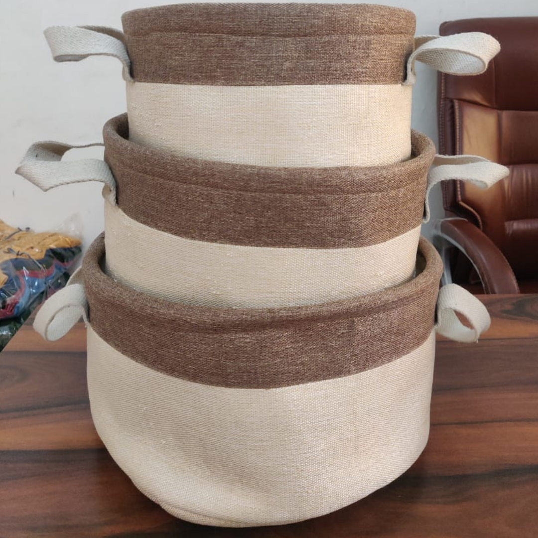 loomsmith-round-jute-storage-basket-rust-beige-color-set-of-three-in-different-sizes-placed-on-table-storage-use