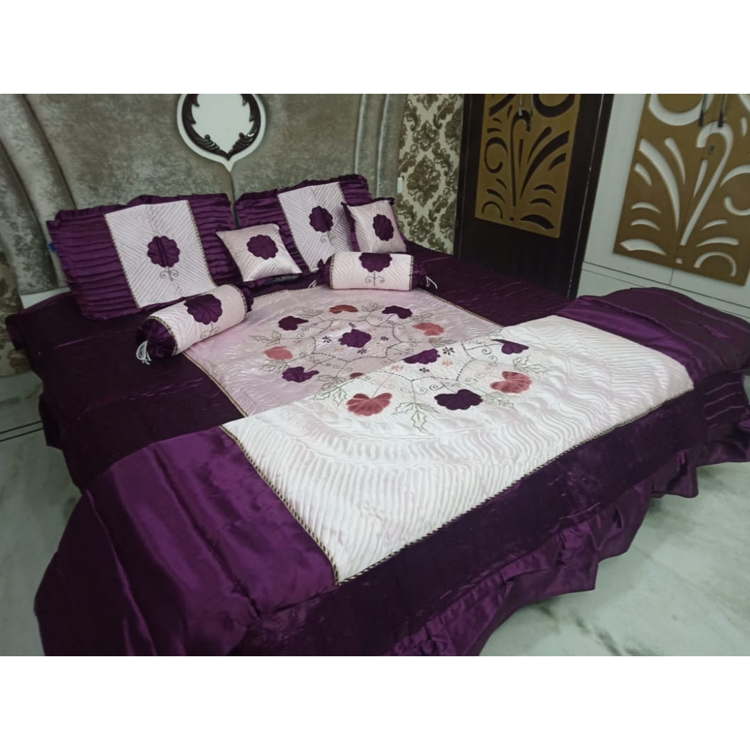 Loomsmith-satin-wedding-bedsheet-8pcs-set-king-size-purple-colour-two-pillow-two-bolster-two-cushions-one-quilt-and-one-bedsheet-pillows-cushions-quilt-are-placed-on-bed-with-bedsheet