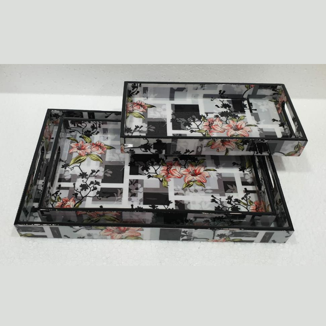 Loomsmith-wooden-tray-set-of-3-with-in-black-white-grey-blocked-pattern-inlcude-flowers-print-on-it-lying-on-the-table-trays-are-in-three-different-sizes
