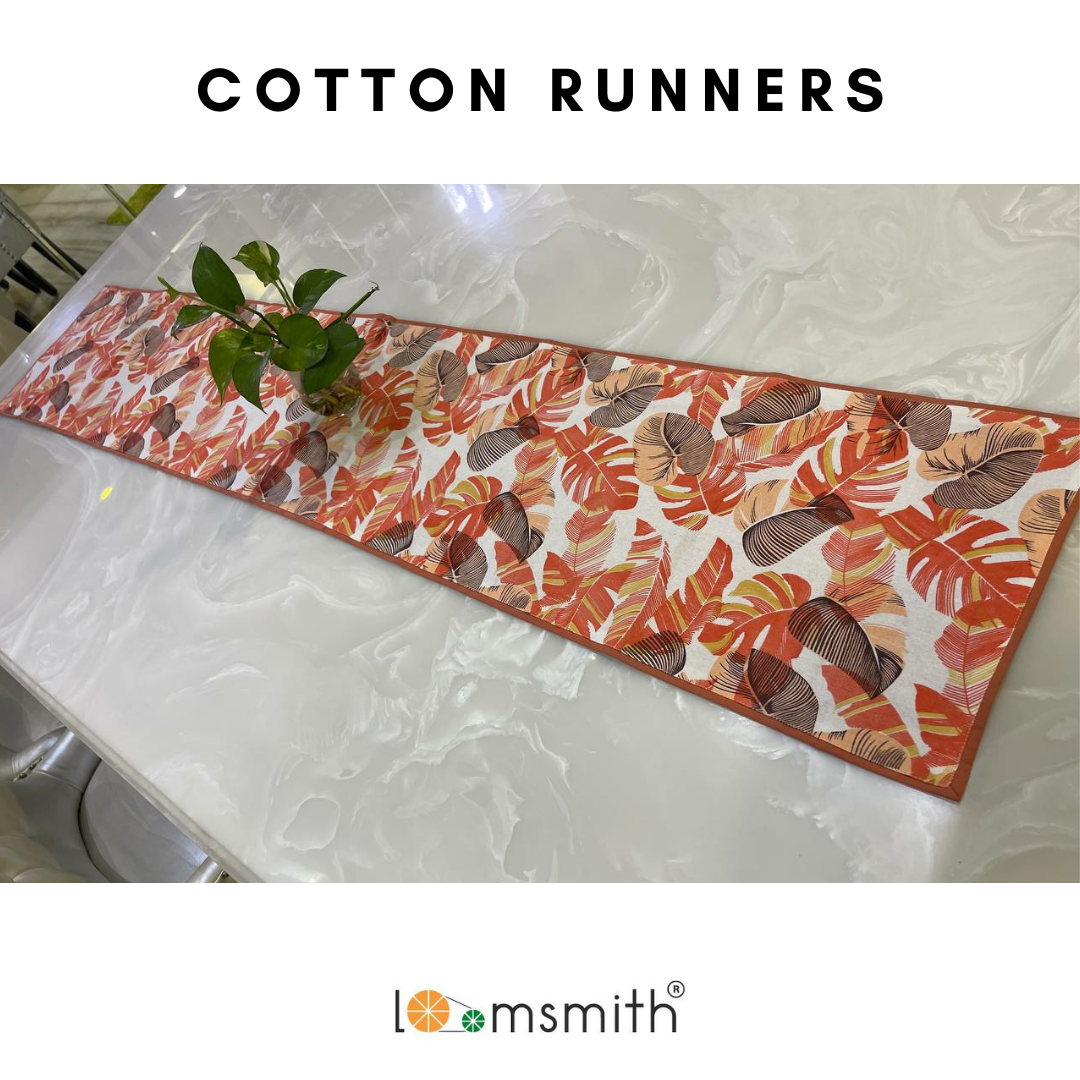 loomsmith-cotton-table-runner-orange-in-color-leaves-print-with-combination-of-colors-on-light-base-borders-sewed-with-orange-fabric