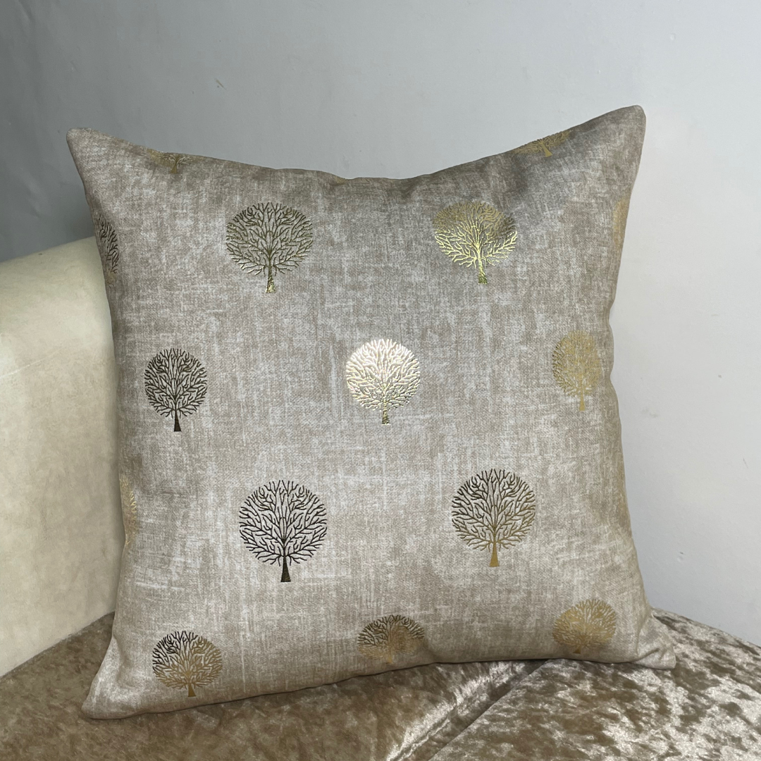 grey cushion cover in velvet fabric tree printed with foil material cushion placed on couch