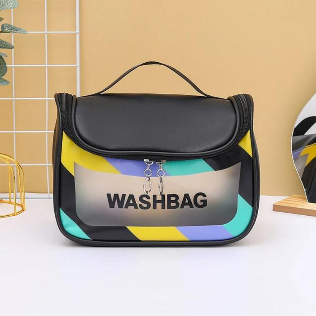 dual zipper black colour cosmetic storage bag with strong handle and transparent window placed on white table with beige background
