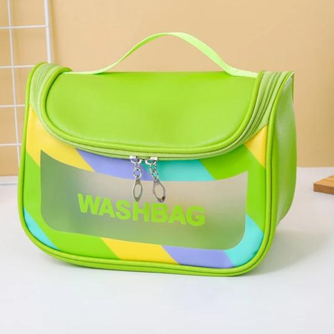 dual zipper green colour cosmetic storage bag with strong handle and transparent window placed on white table with beige background