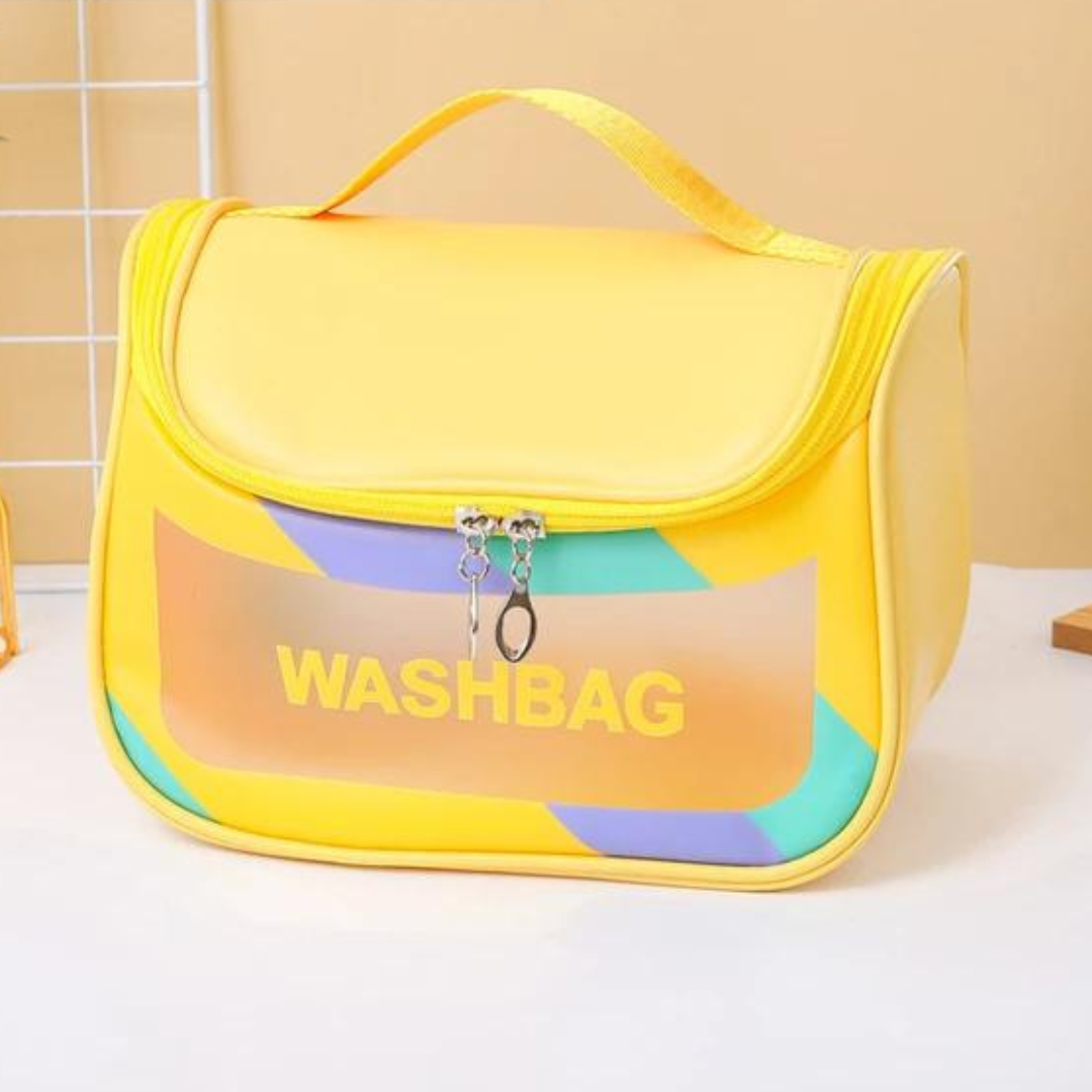dual zipper yellow colour cosmetic storage bag with strong handle and transparent window placed on white table with beige background