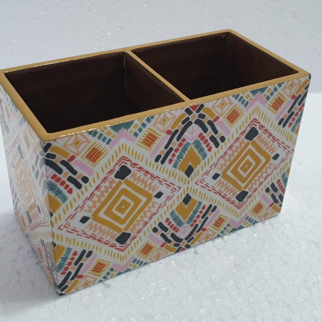 wooden-printed-cutlery-holder-light-mustard-multicoloured-abstract-pattern-lying-on-the-form-holder-have-two-block-storage