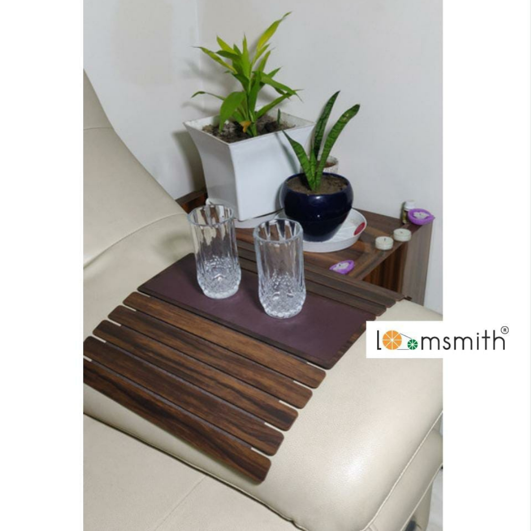 rollable arm rest tray of wood material easy to place on sofa or couch providing stable surface to glasses